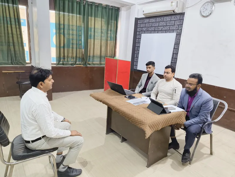 Interview panel assessing a candidate